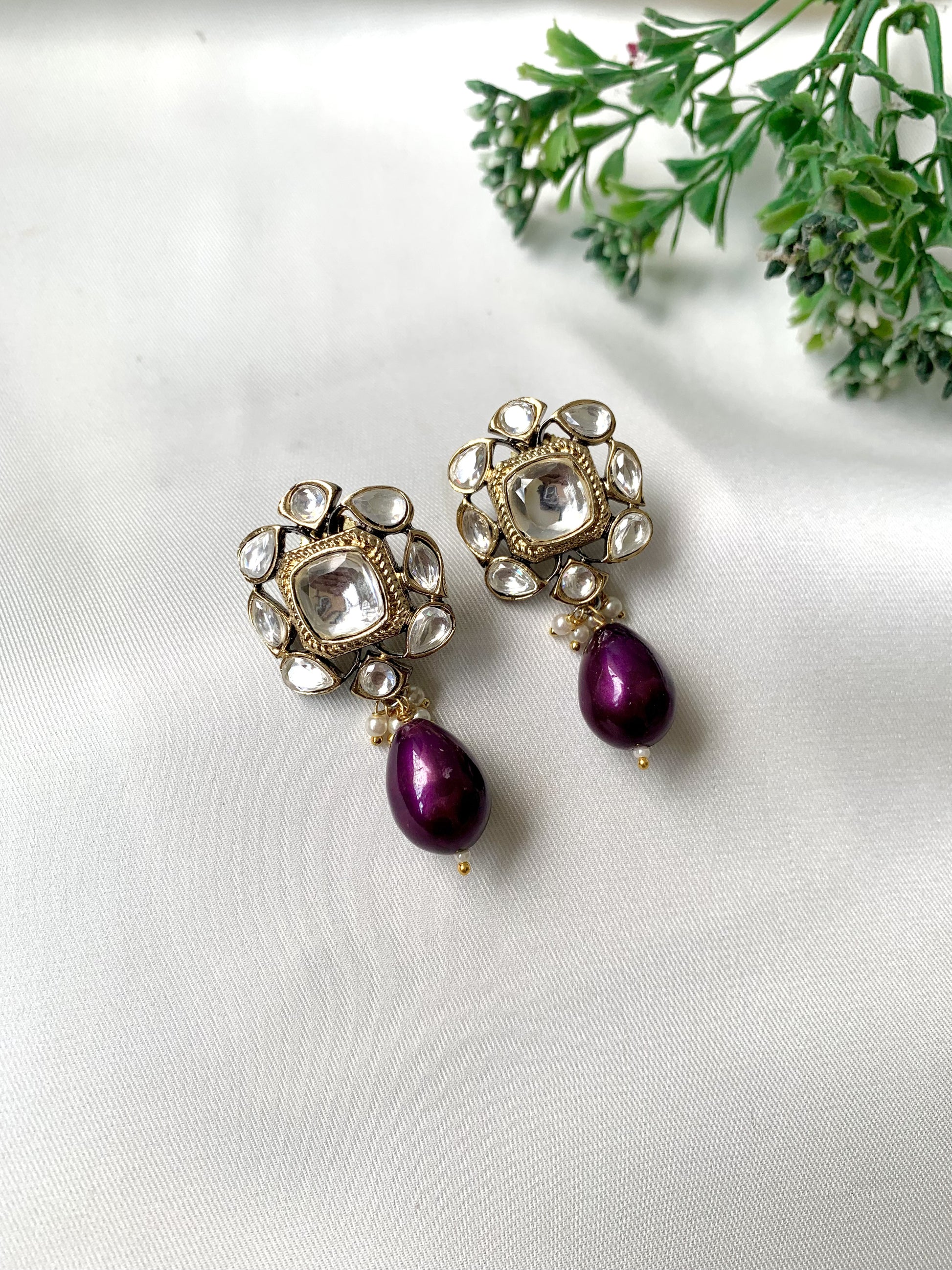 Handcrafted Zareen Earrings in Purple Amethyst Pearl with Polki Kundan stones and Victorian gold finish by Zamal Jewels