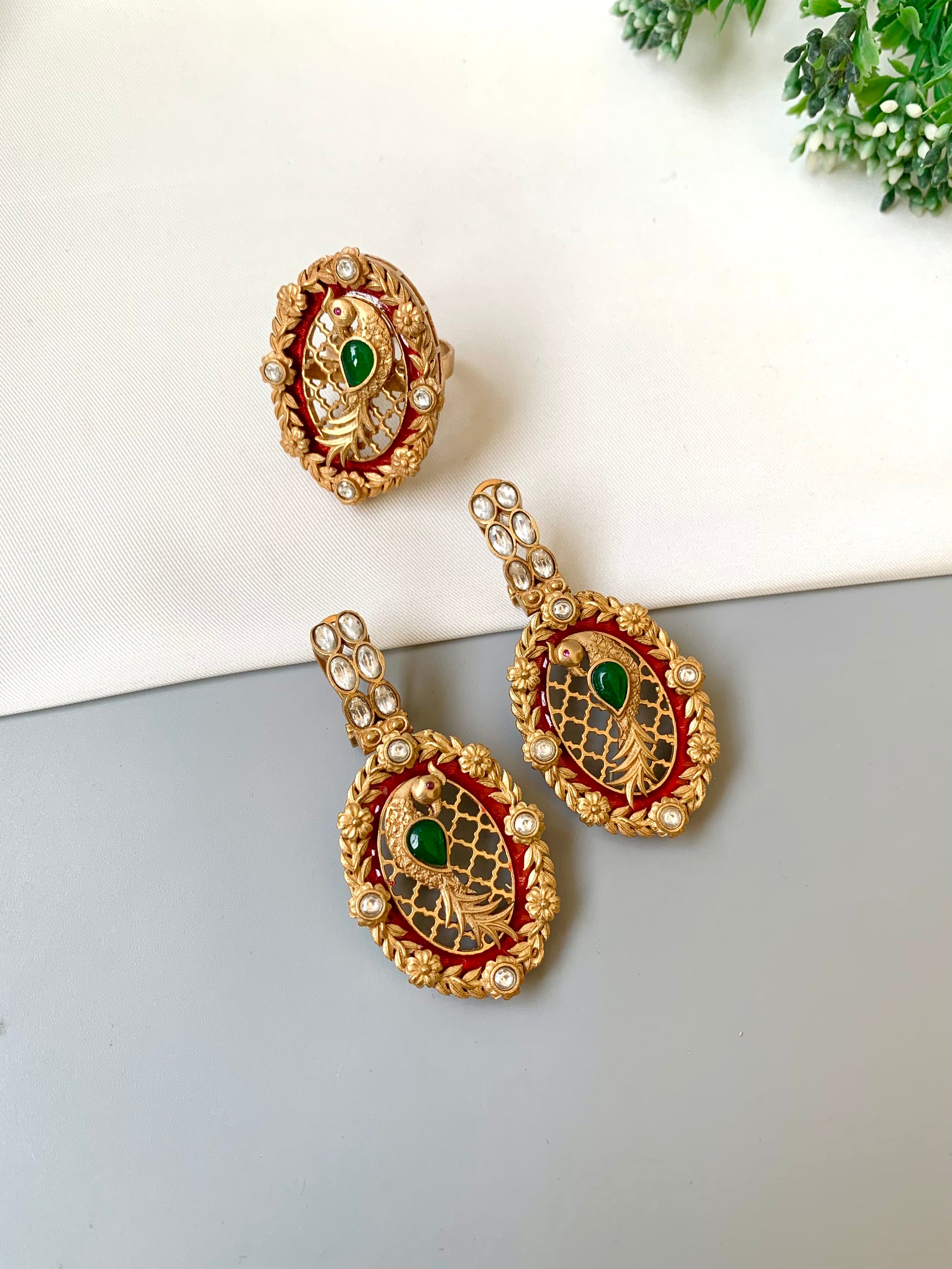 Zariya handcrafted gold plated combo set with moissanite kundan, emerald and hand painted meena including earrings and adjustable ring