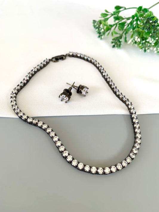 Front view of oxidized rhodium necklace with matching American Diamond studs