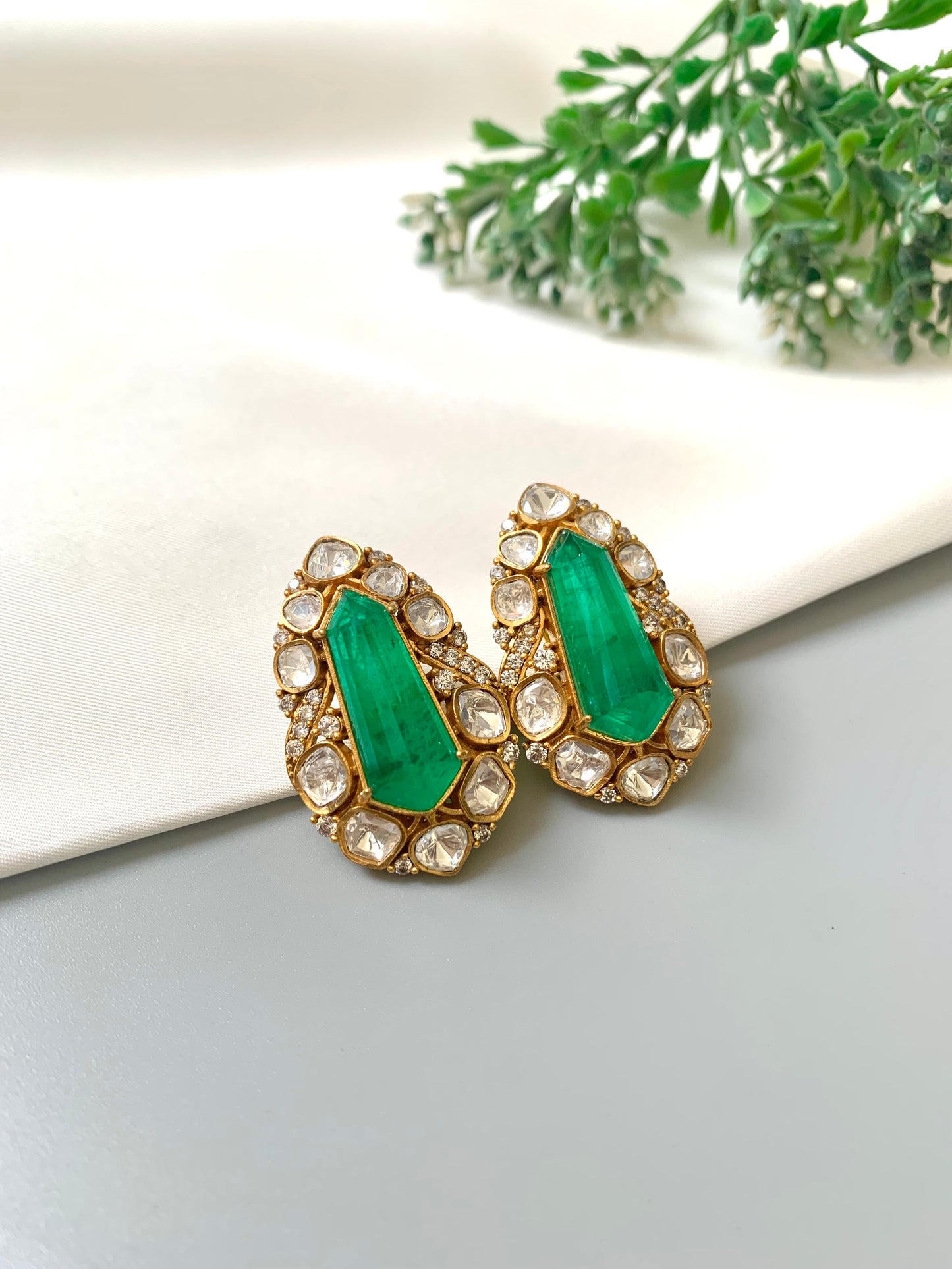 Ziva emerald statement studs in Victorian gold plating with moissanite kundan and American diamonds