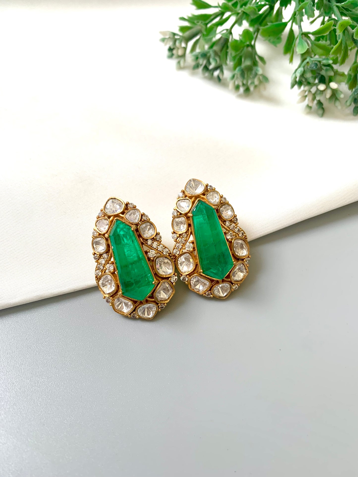 Ziva emerald statement studs in Victorian gold plating with moissanite kundan and American diamonds