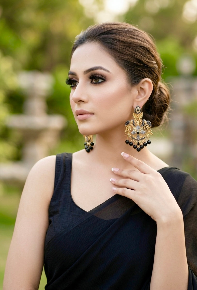 Zulehka black onyx earrings in gold plating with American diamonds