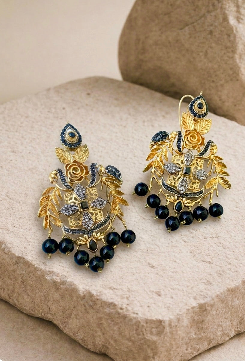 Zulehka black onyx earrings in gold plating with American diamonds