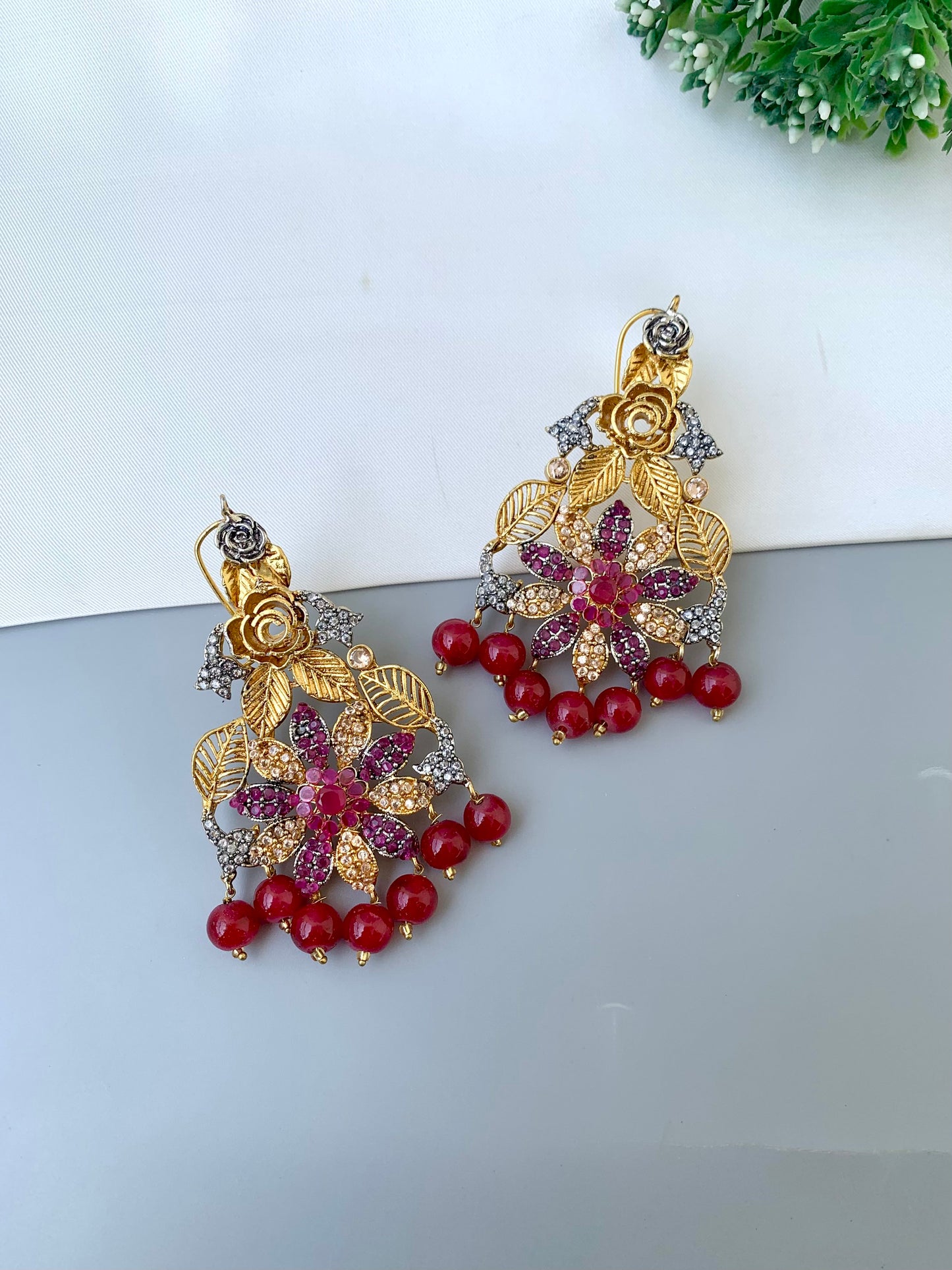 Zulehka ruby  earrings in gold plating with American diamonds
