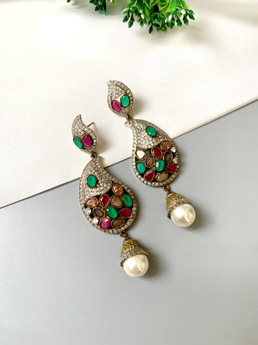 Zuleikha Gemstone Chandelier Earrings in rhodium plating with American Diamonds, Rubies, Emeralds, Sapphires, Champagne stones, and pearl drops